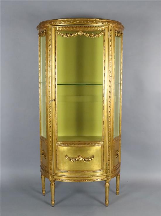 A Louis XVI style carved giltwood vitrine, W.2ft 11in. D.1ft 4in. H.5ft 9in.
